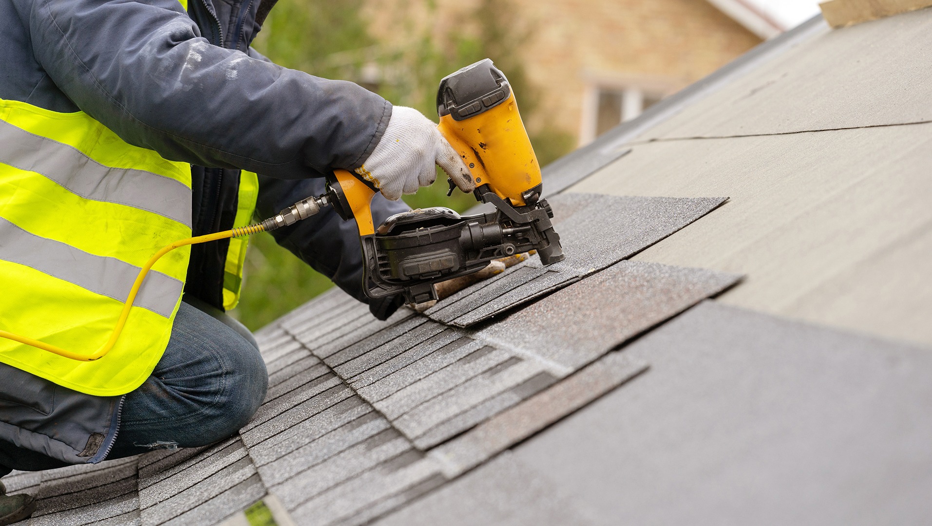Licensed Roofing Contractor at work on a shingle roof in LA County